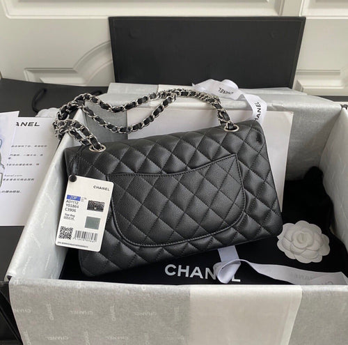 CHANEL Black Quilted Caviar
Leather Shoulder Bag with Silver Hardware
