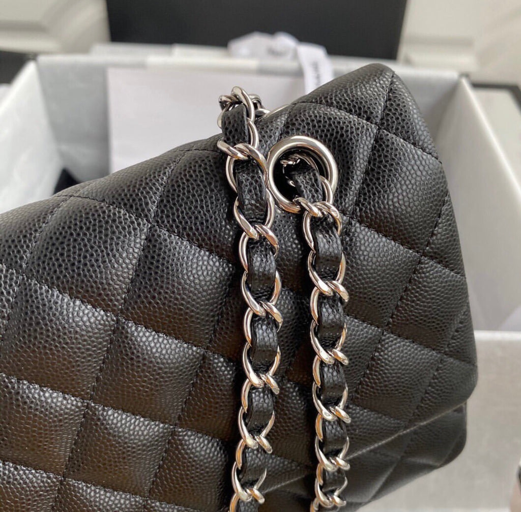 CHANEL Black Quilted Caviar
Leather Shoulder Bag with Silver Hardware