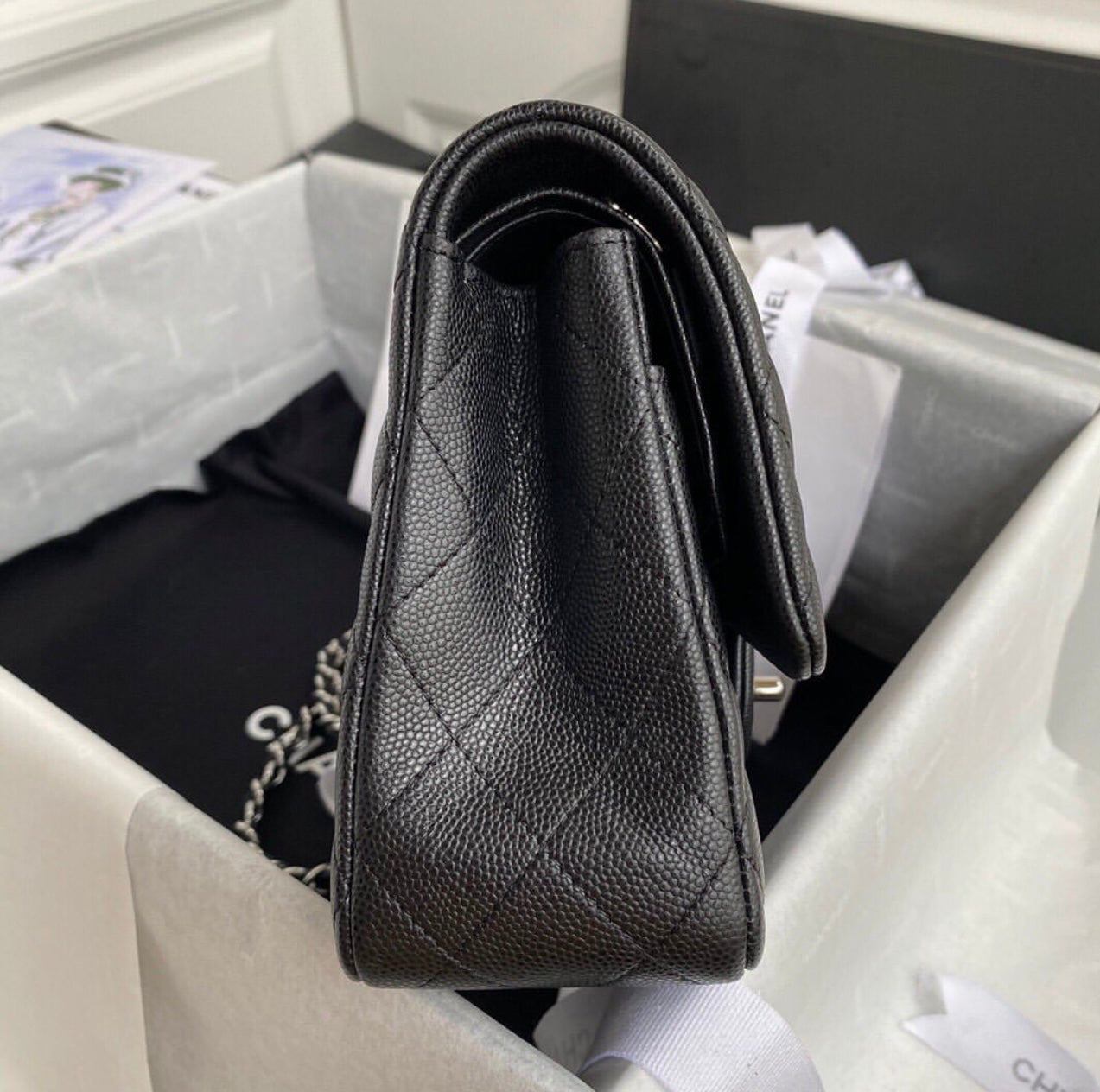 CHANEL Black Quilted Caviar
Leather Shoulder Bag with Silver Hardware