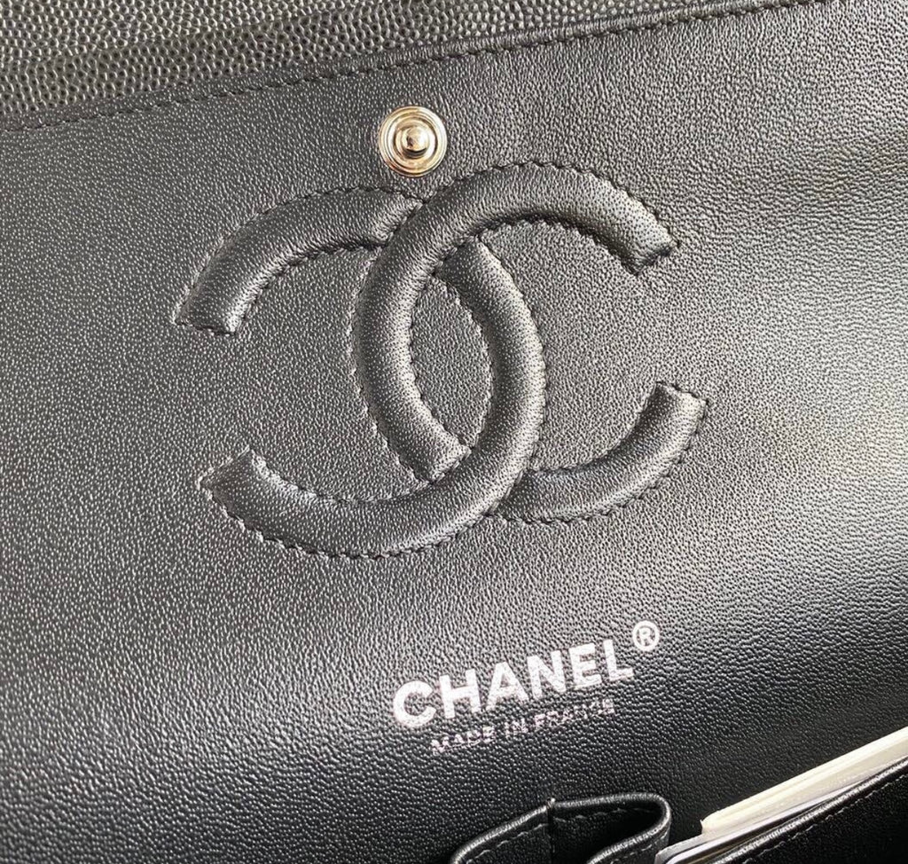 CHANEL Black Quilted Caviar
Leather Shoulder Bag with Silver Hardware