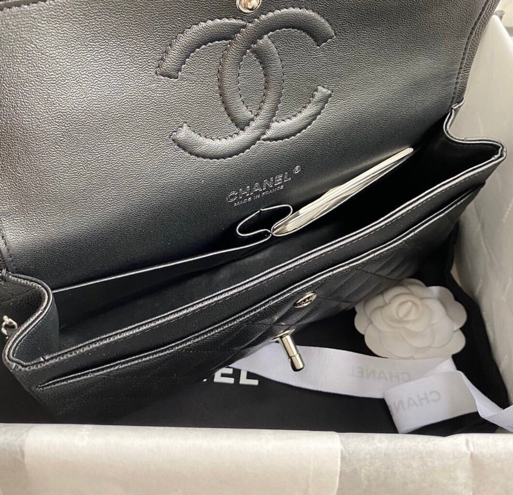 CHANEL Black Quilted Caviar
Leather Shoulder Bag with Silver Hardware