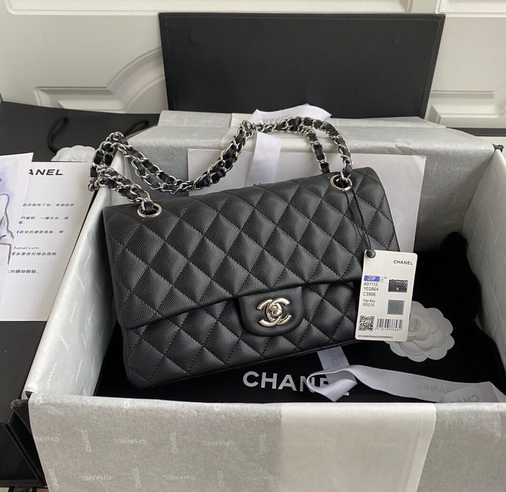CHANEL Black Quilted Caviar
Leather Shoulder Bag with Silver Hardware